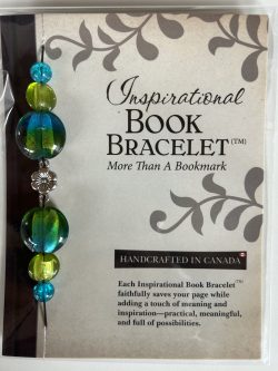 Packaged Inspirational Book Bracelet featuring dual-toned turquoise blue and lime green disc beads, olive accents, blue crackle beads, and a central silver flower spacer mounted on a branded backing card.