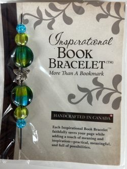 Packaged Inspirational Book Bracelet featuring dual-toned blue and green disc beads, olive accent beads, and a silver butterfly spacer mounted on a branded backing card.