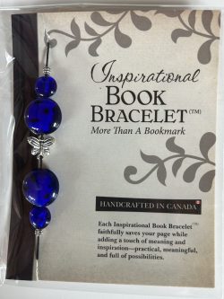 Packaged Inspirational Book Bracelet featuring rich cobalt blue disc beads, blue sphere accents, and a silver butterfly spacer mounted on a branded backing card.