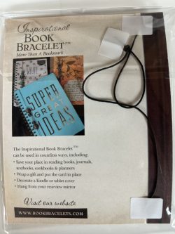 Back of an Inspirational Book Bracelet packaging card showing product usage ideas, website URL, lifestyle photos, and secured black elastic cord mounted in clear cellophane packaging.